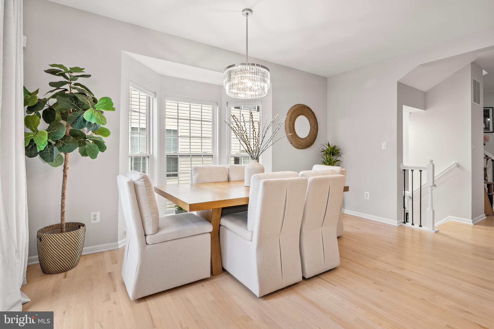 1750 Theale Way Hanover, MD 21076 - Photo 20 of 42 a living room with furniture and a chandelier