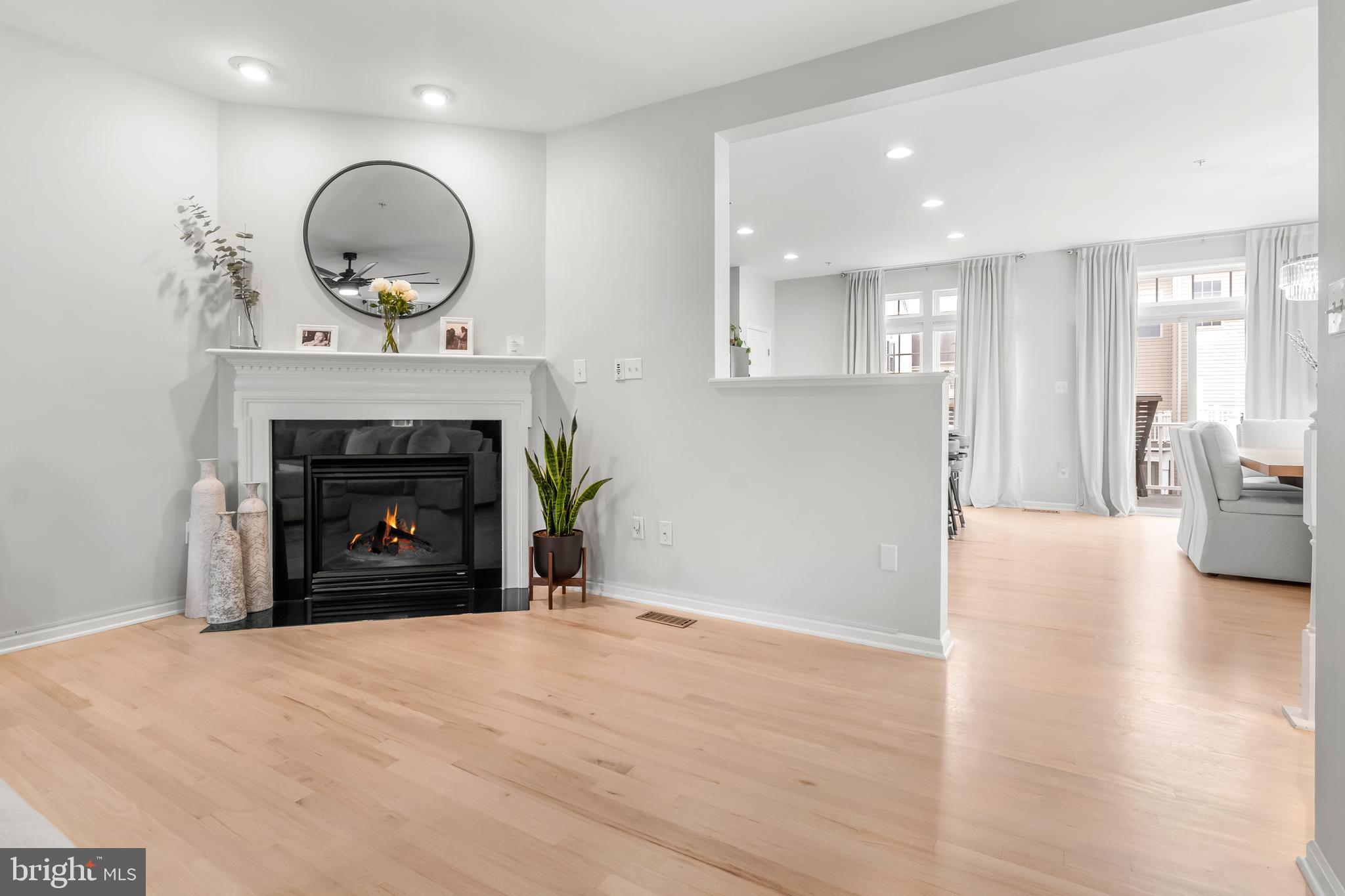 1750 Theale Way Hanover, MD 21076 - Photo 23 of 42 a view of an empty room with a fireplace