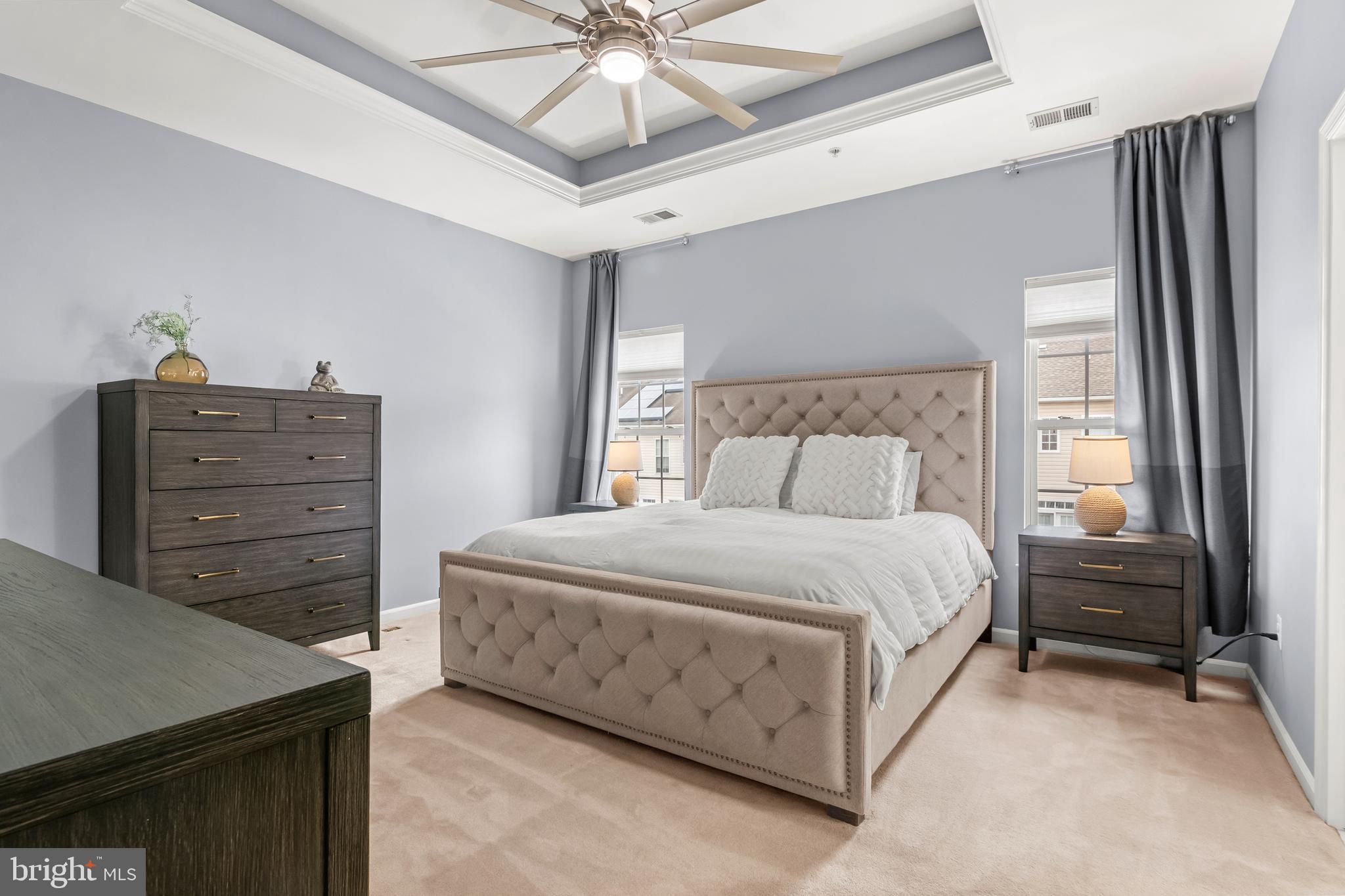 1750 Theale Way Hanover, MD 21076 - Photo 29 of 42 a bedroom with a bed and a chandelier