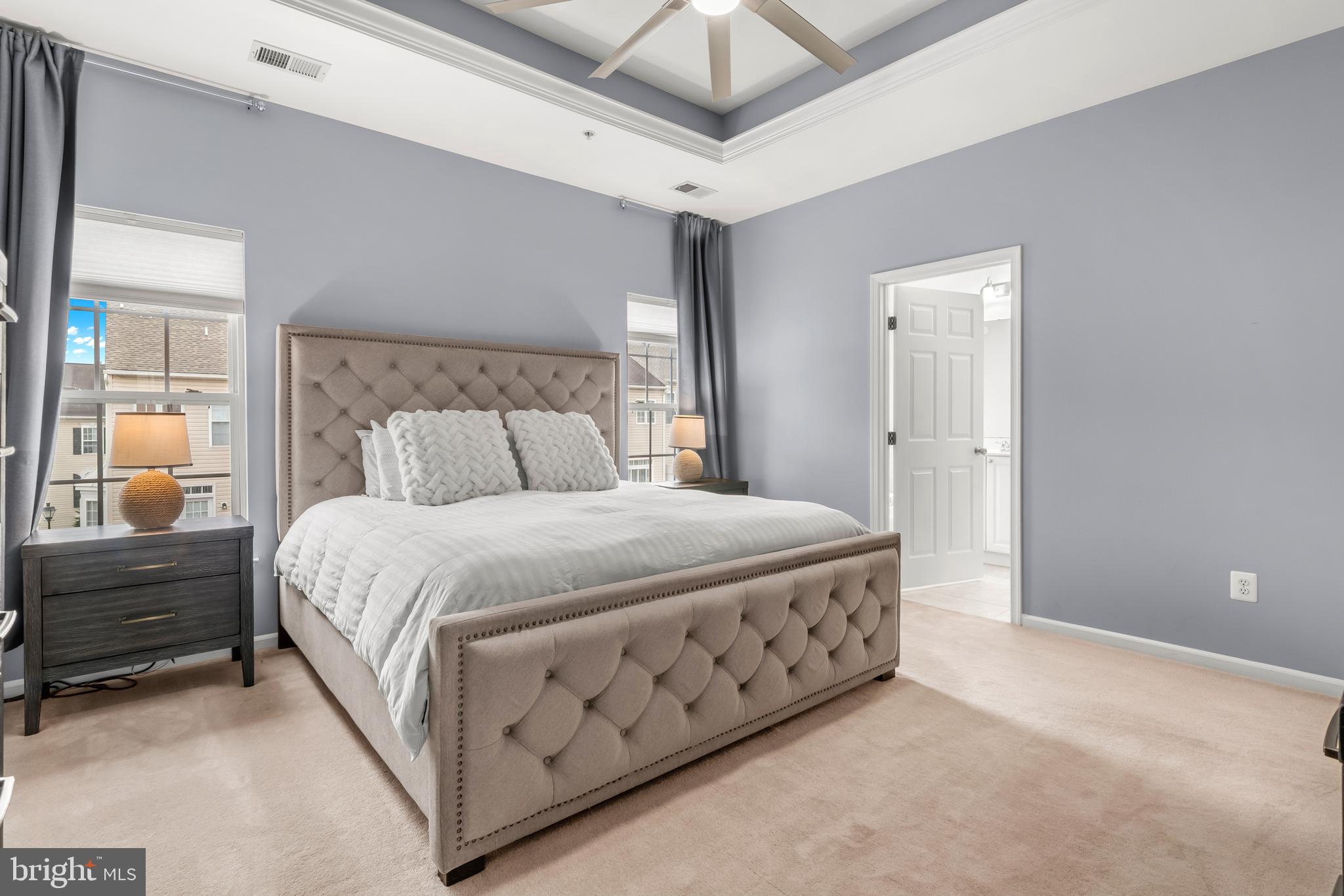 1750 Theale Way Hanover, MD 21076 - Photo 30 of 42 a bedroom with a bed and a ceiling fan