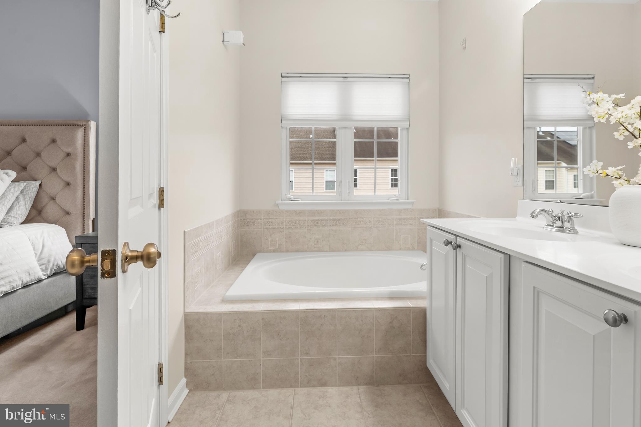 1750 Theale Way Hanover, MD 21076 - Photo 33 of 42 a bathroom with a bathtub sink and toilet