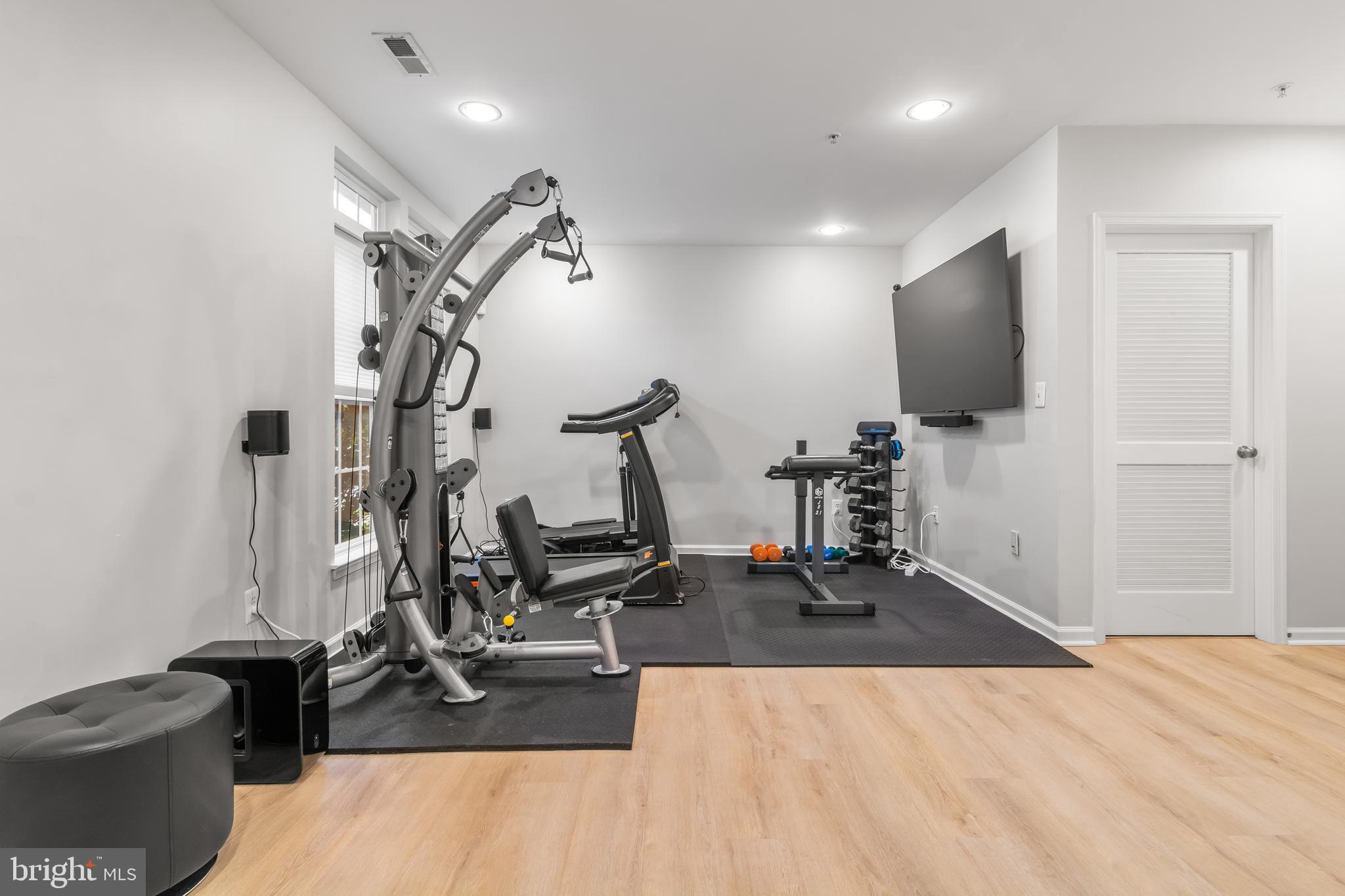 1750 Theale Way Hanover, MD 21076 - Photo 8 of 42 a view of a room with gym equipment