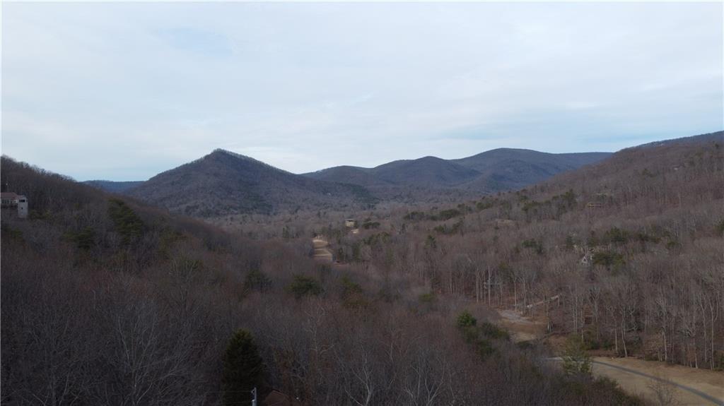 0 Mulligan Way Jasper, GA 30143 - Photo 5 of 7 a view of a mountain in the distance in a field