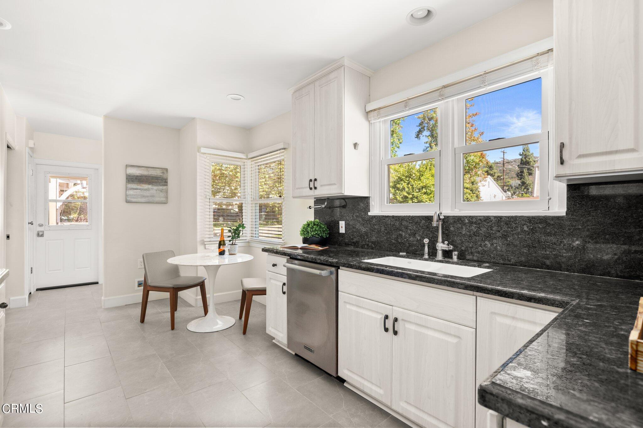 2405 Sylvan Lane Glendale, CA 91208 - Photo 12 of 43 a kitchen with a sink and cabinets