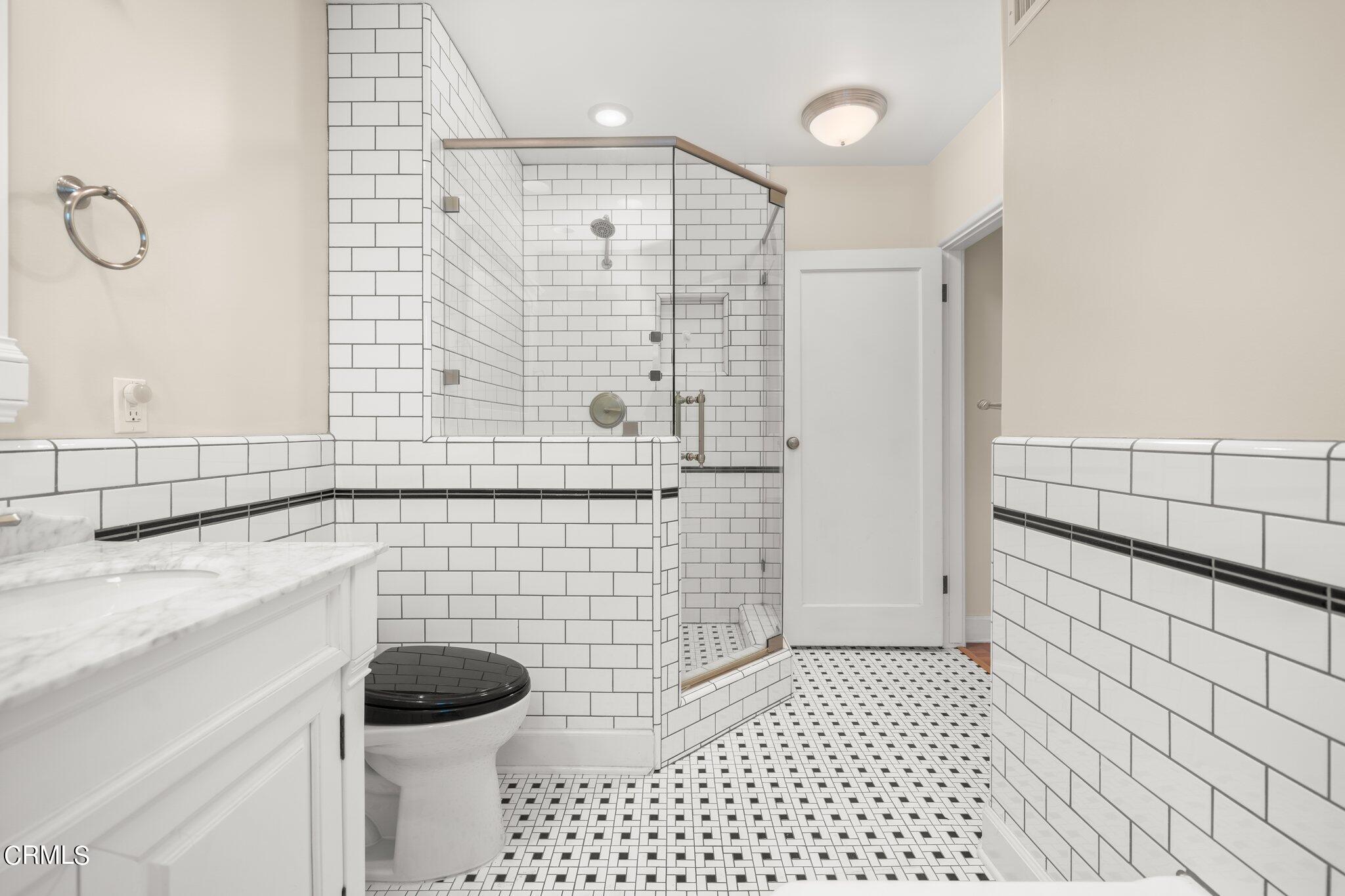 2405 Sylvan Lane Glendale, CA 91208 - Photo 21 of 43 a bathroom with a sink a toilet and shower