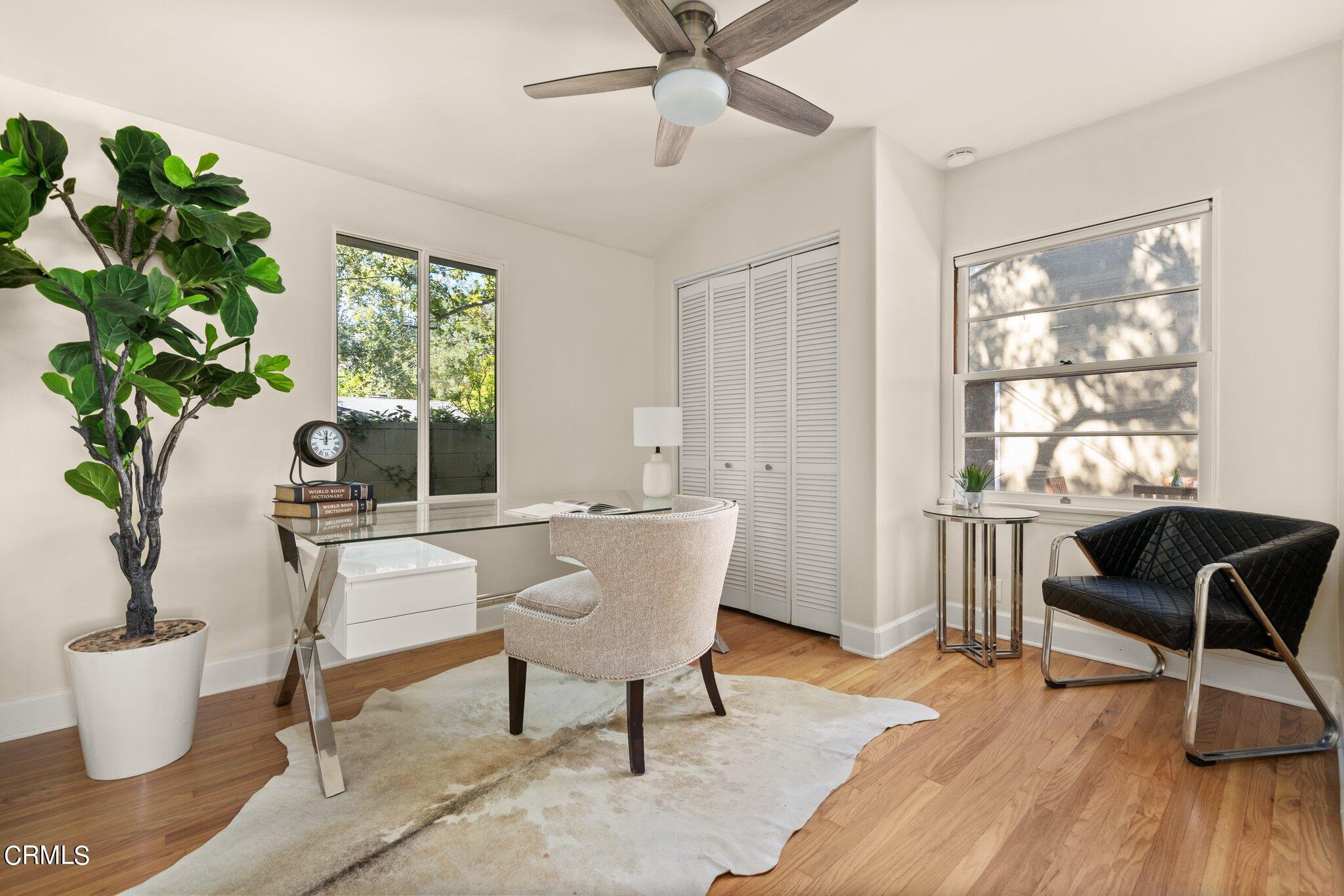 2405 Sylvan Lane Glendale, CA 91208 - Photo 27 of 43 a living room with furniture and a potted plant