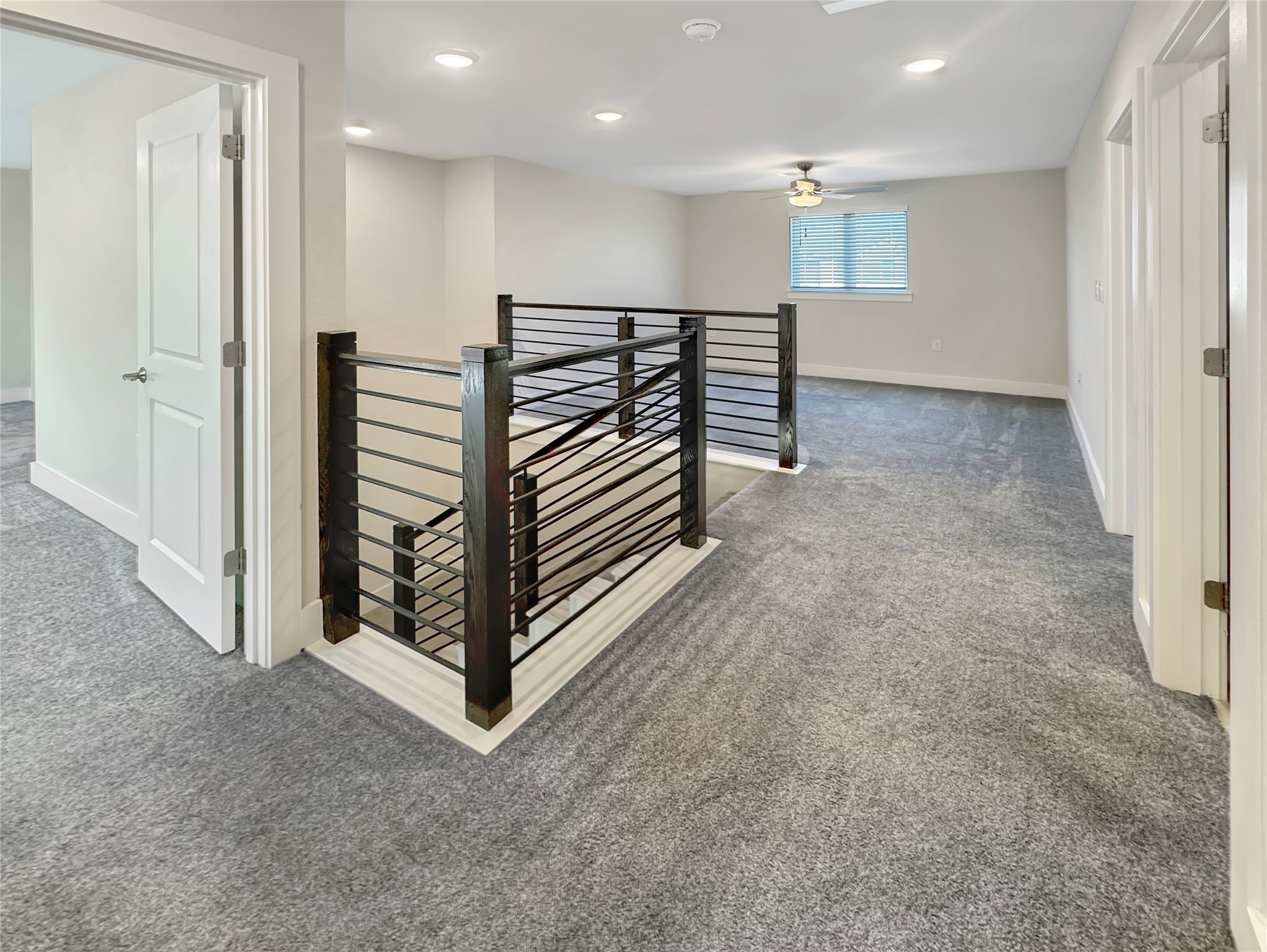 1704 Carvin Way Pflugerville, TX 78660 - Photo 16 of 30 Corridor with an upstairs landing, carpet, and recessed lighting