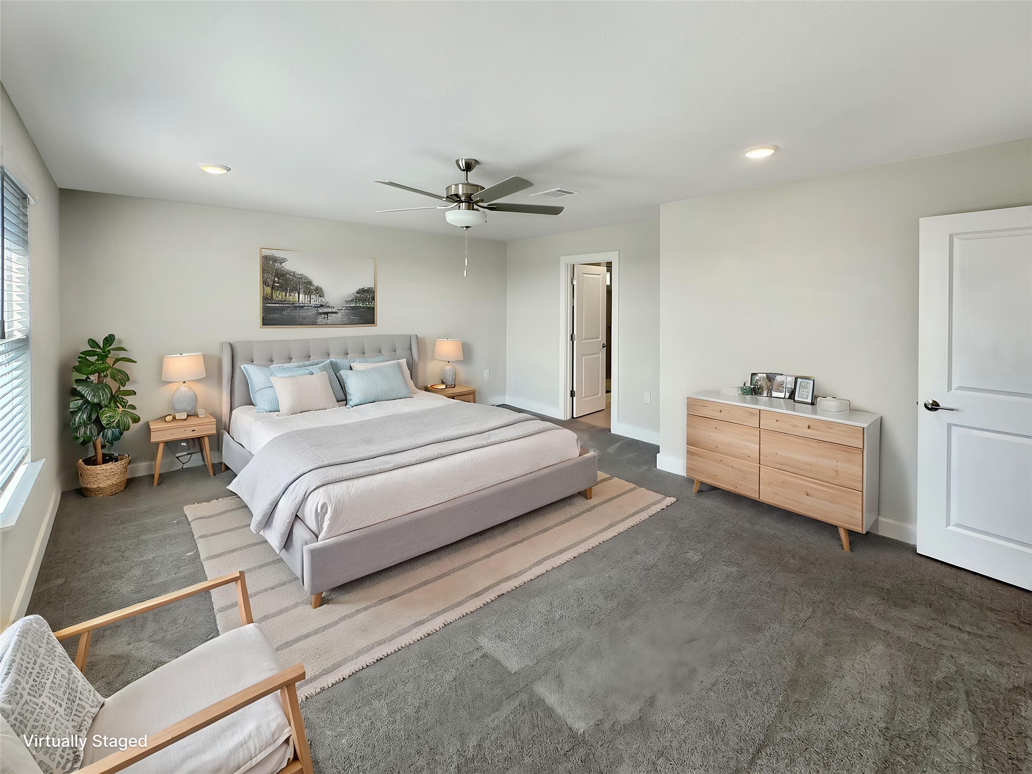 1704 Carvin Way Pflugerville, TX 78660 - Photo 19 of 30 Bedroom with a ceiling fan, dark carpet, and recessed lighting