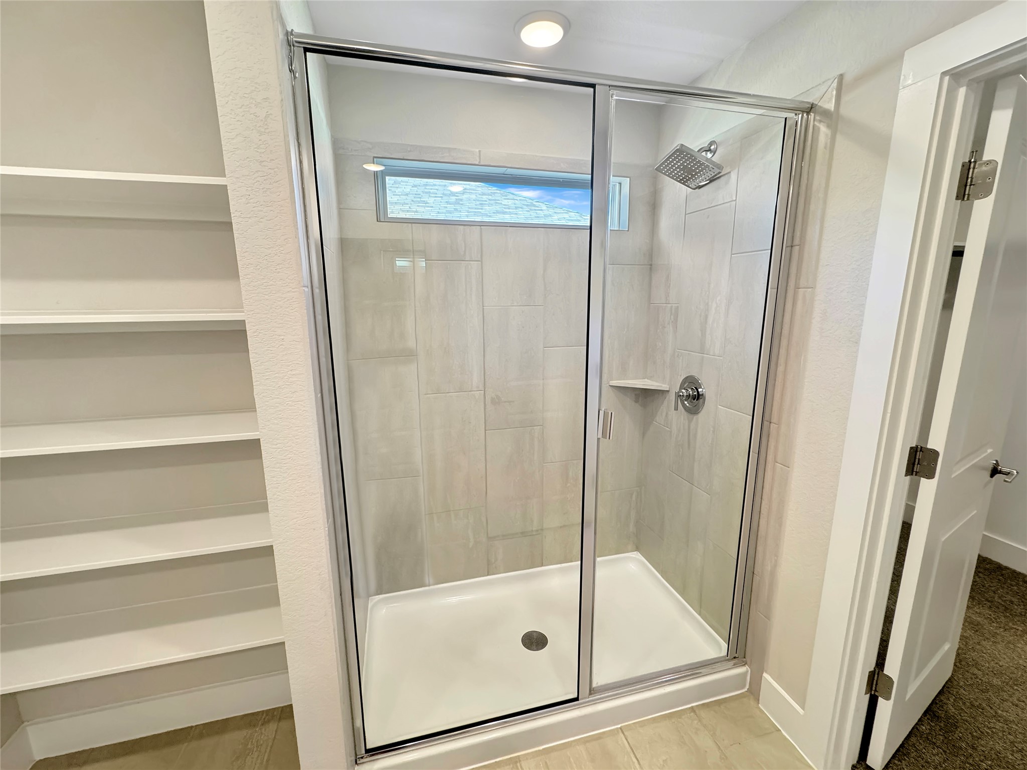 1704 Carvin Way Pflugerville, TX 78660 - Photo 22 of 30 Full bath with a shower stall and a closet