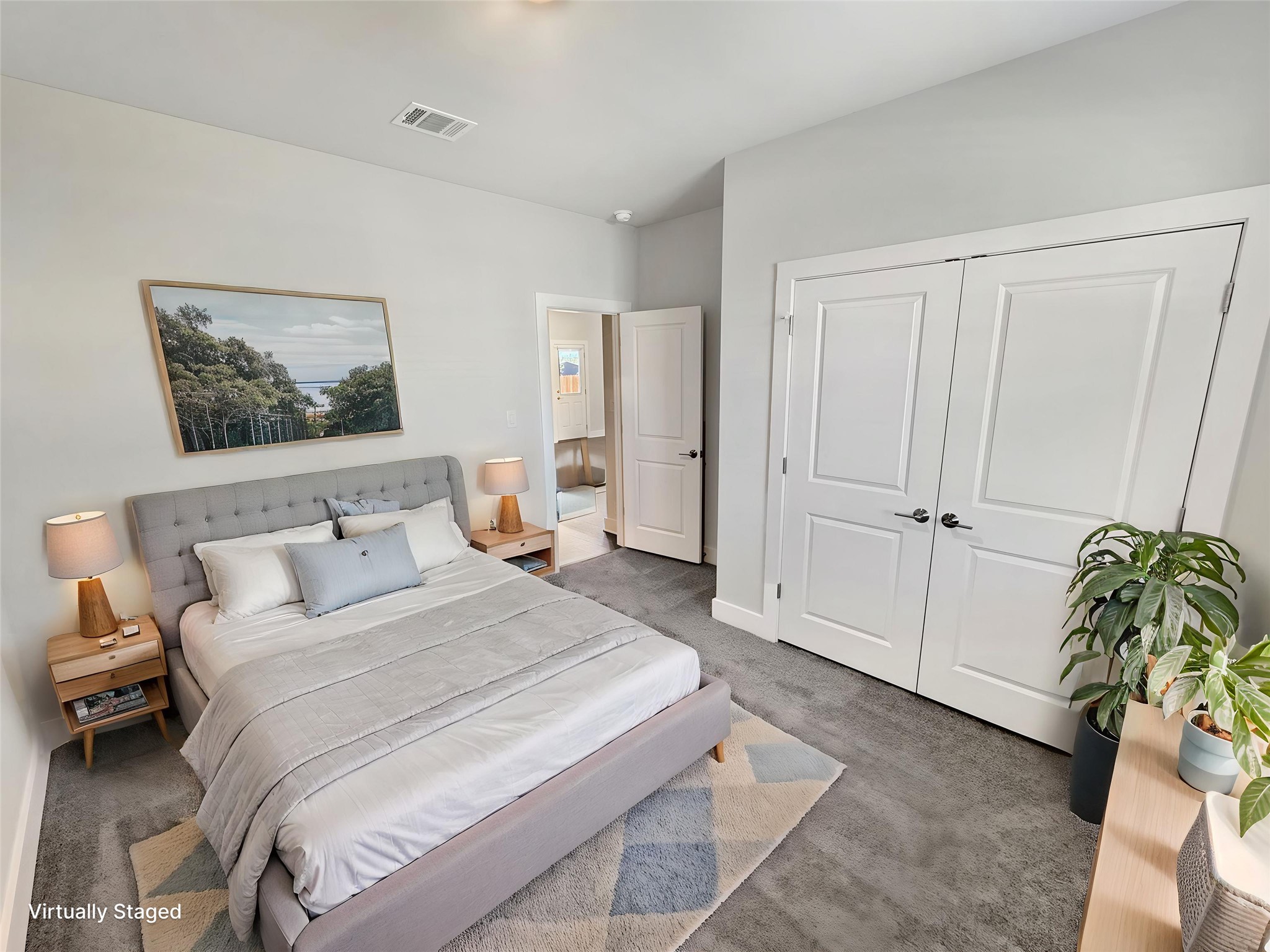1704 Carvin Way Pflugerville, TX 78660 - Photo 4 of 30 Downstairs Bedroom with carpet floors and a closet
