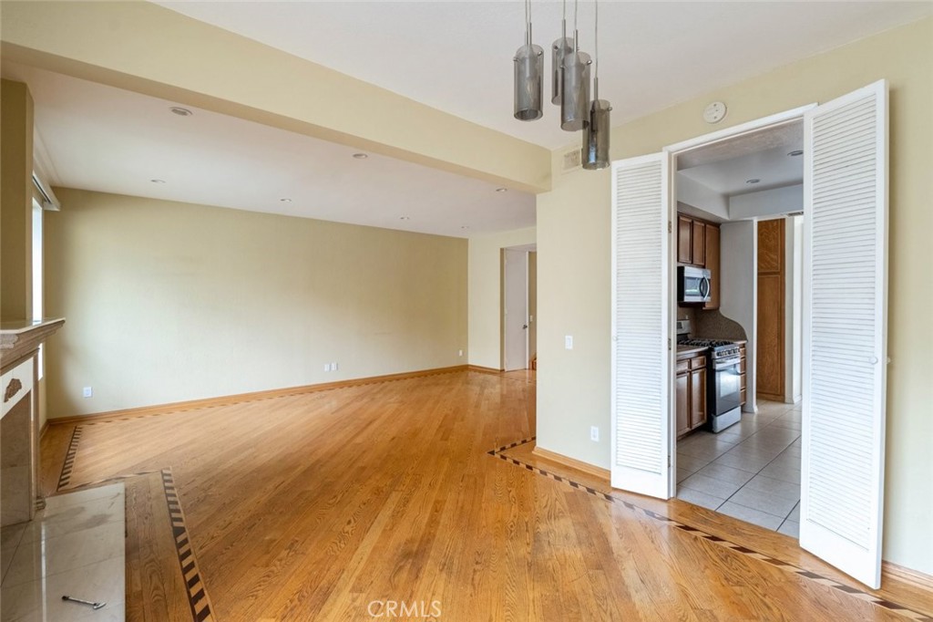 1244 Valley View Road, Unit 129 Glendale, CA 91202 - Photo 12 of 42 a view of empty room with wooden floor