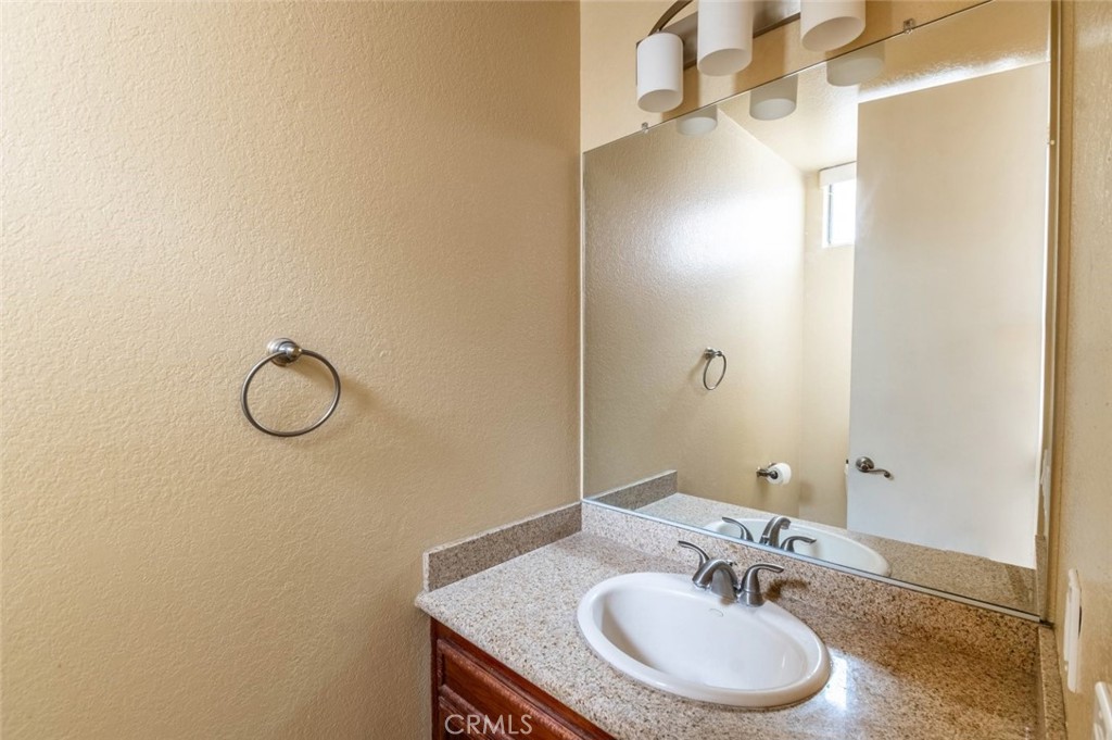 1244 Valley View Road, Unit 129 Glendale, CA 91202 - Photo 18 of 42 a bathroom with a sink and a mirror