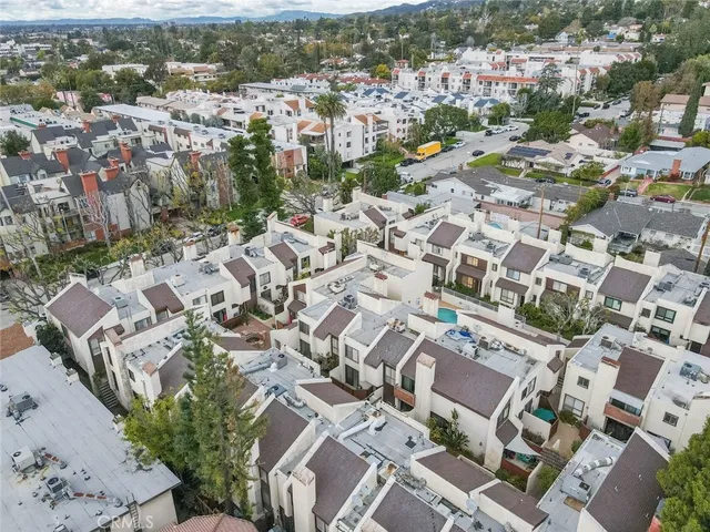 an aerial view of a city with lots of residential buildings