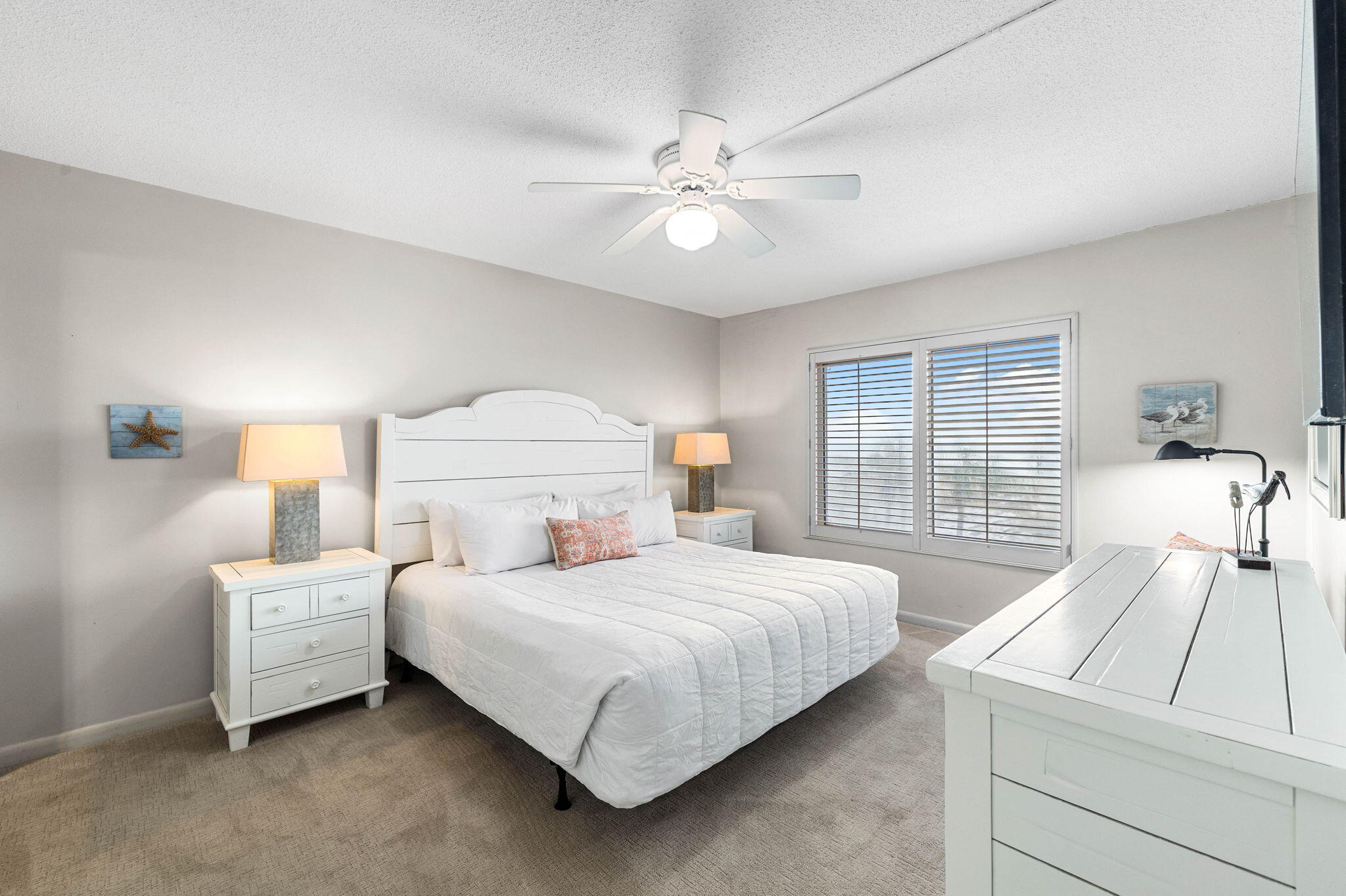 600 Gulf Shore Drive, Unit 304 Destin, FL 32541 - Photo 20 of 38 a bedroom with a bed and a large window