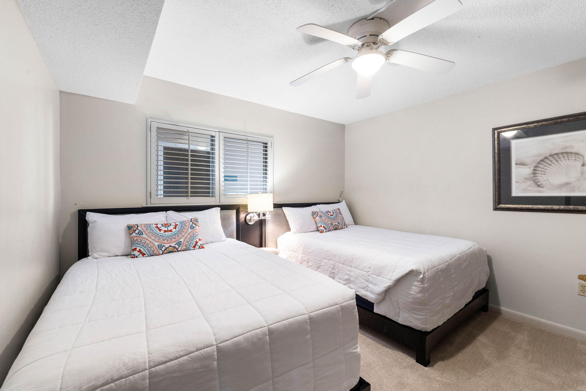 600 Gulf Shore Drive, Unit 304 Destin, FL 32541 - Photo 24 of 38 a bedroom with beds and window