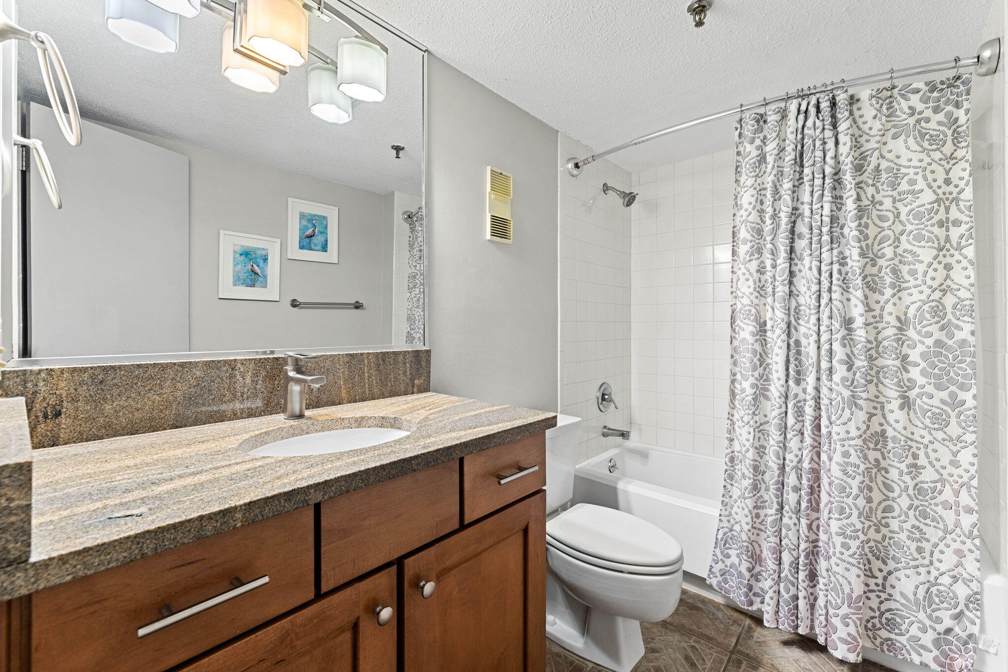 600 Gulf Shore Drive, Unit 304 Destin, FL 32541 - Photo 26 of 38 a bathroom with a sink a toilet and shower