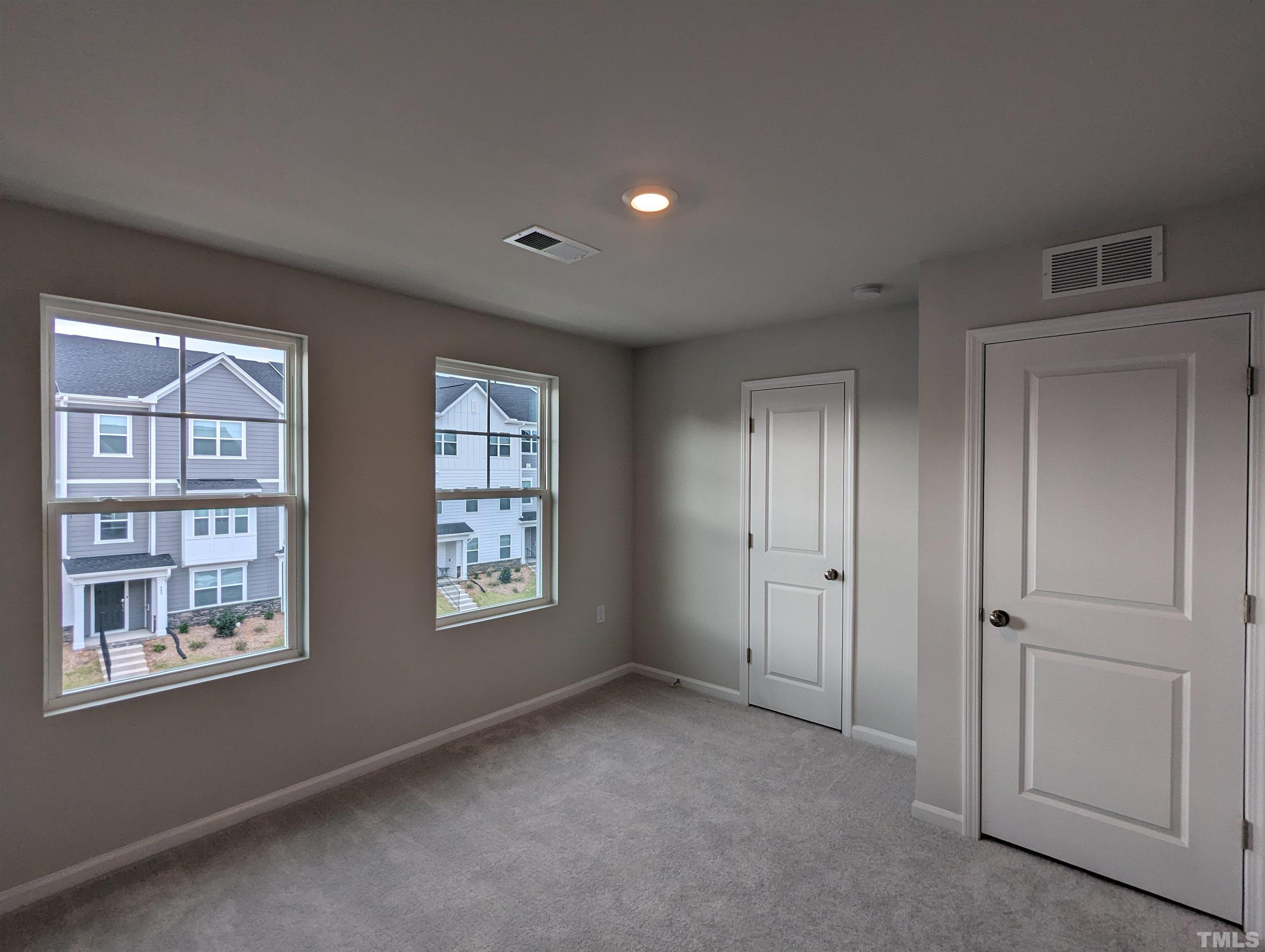 604 Gimari Drive Wake Forest, NC 27587 - Photo 12 of 20 a view of an empty room with a window
