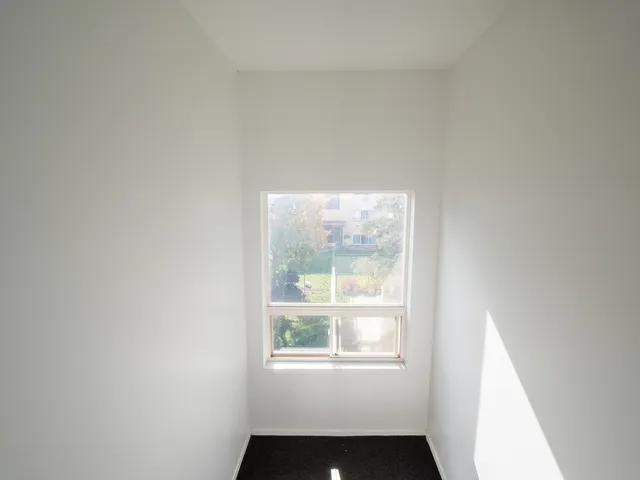 an empty room with a window