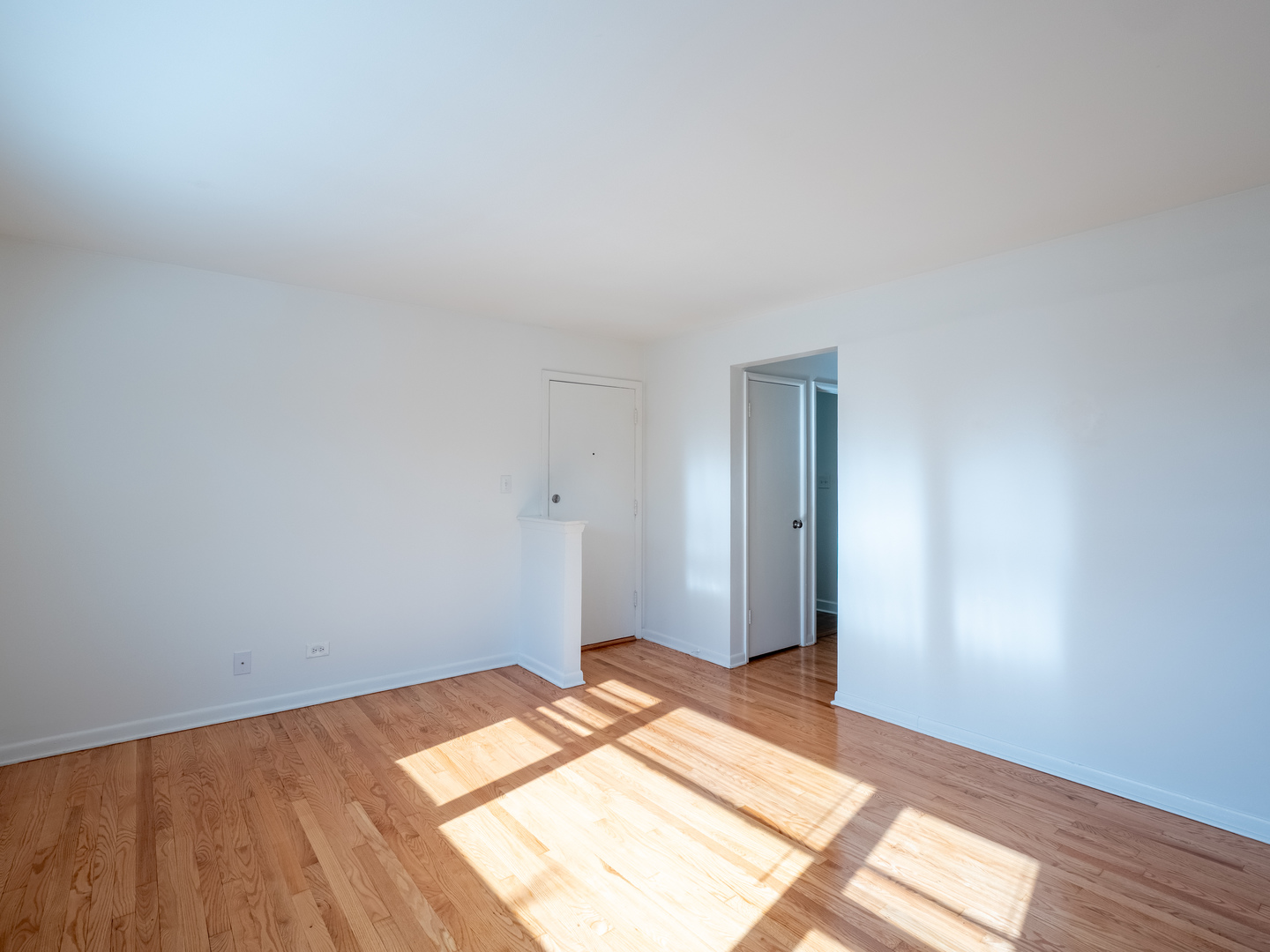 9662 Golf Terrace, Unit 2E Des Plaines, IL 60016 - Photo 10 of 24 a view of a room with wooden floor and bedroom
