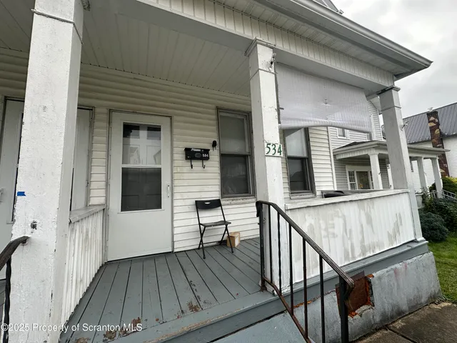 a view of a house with wooden floor