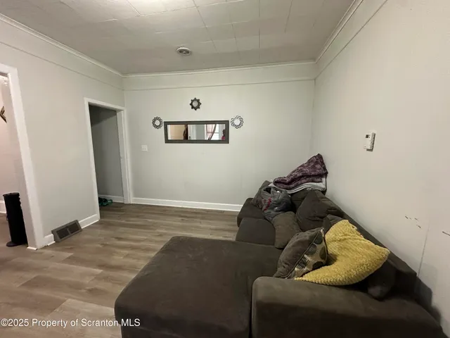 a bed room with a bed and a couch