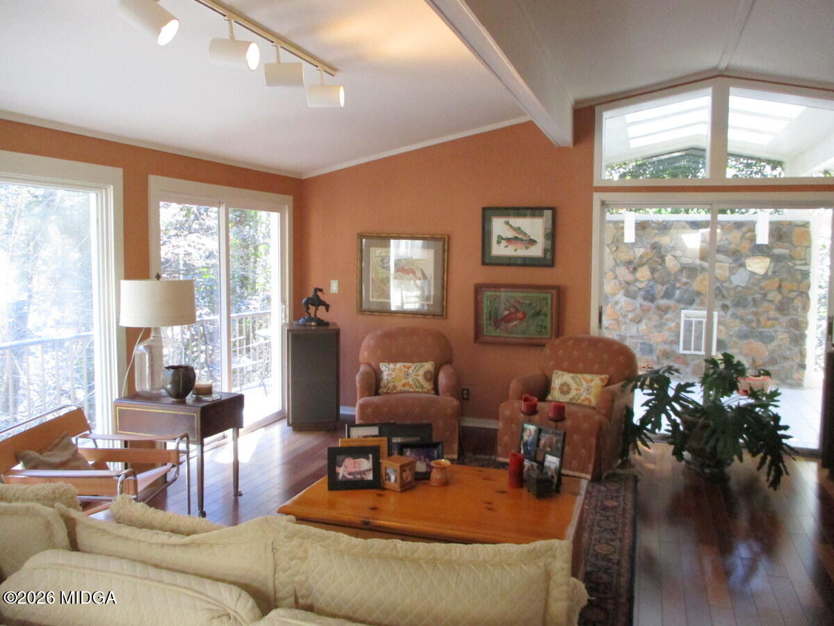 1121 South Jackson Springs Road Macon, GA 31211 - Photo 18 of 29 a living room with furniture and a large window