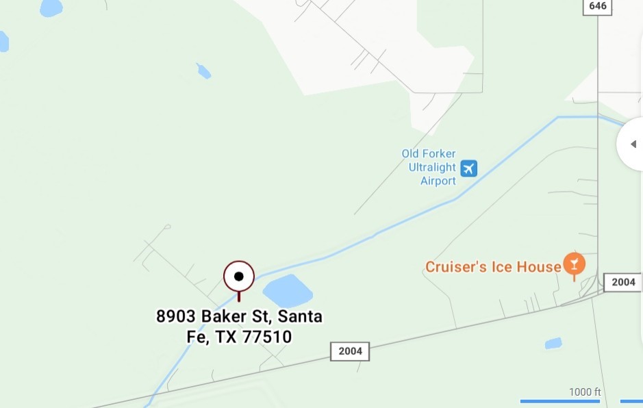 8903 Baker Street Santa Fe, TX 77510 - Photo 13 of 14 a close up of a street sign