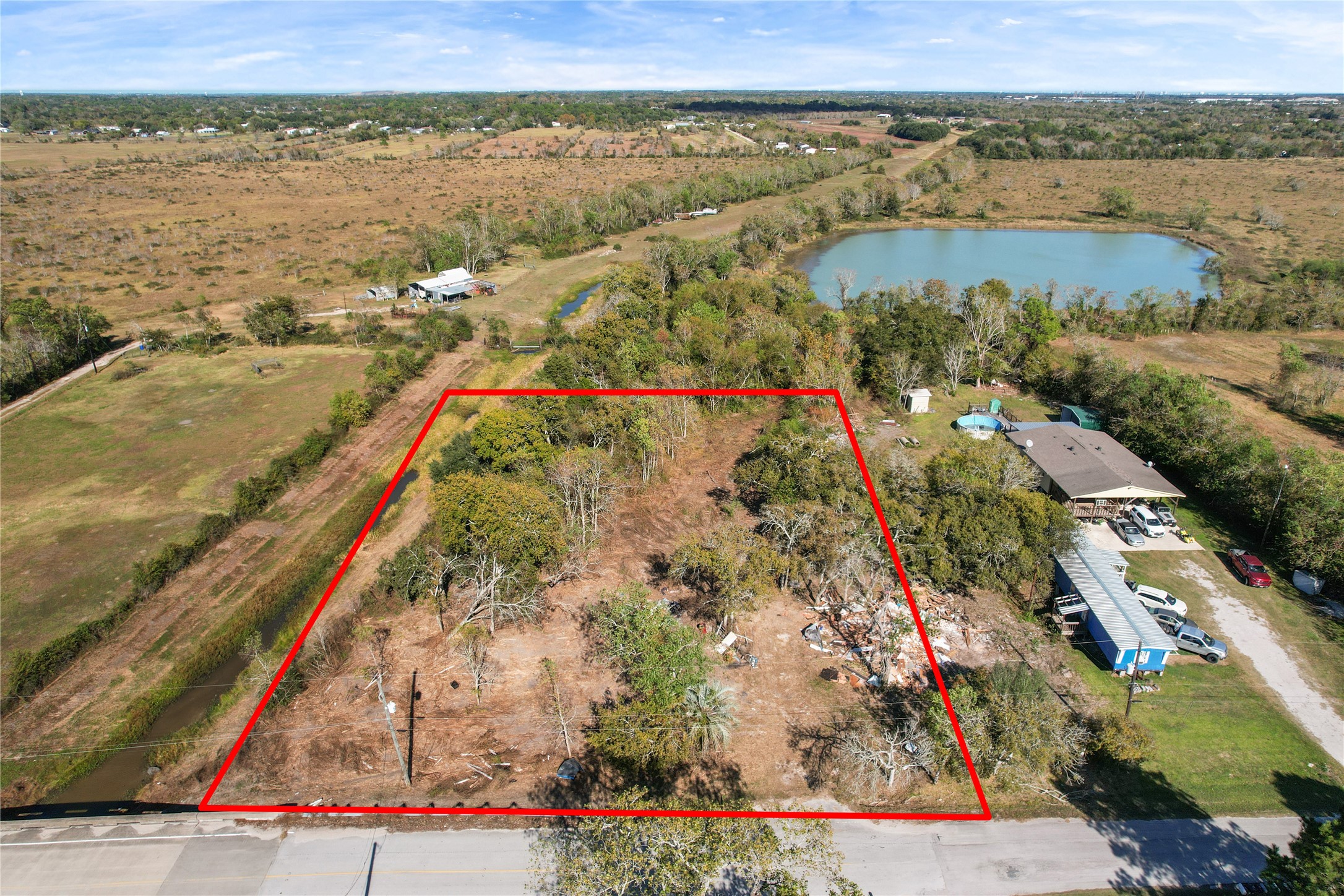 8903 Baker Street Santa Fe, TX 77510 - Photo 2 of 14 an aerial view of residential houses with outdoor space