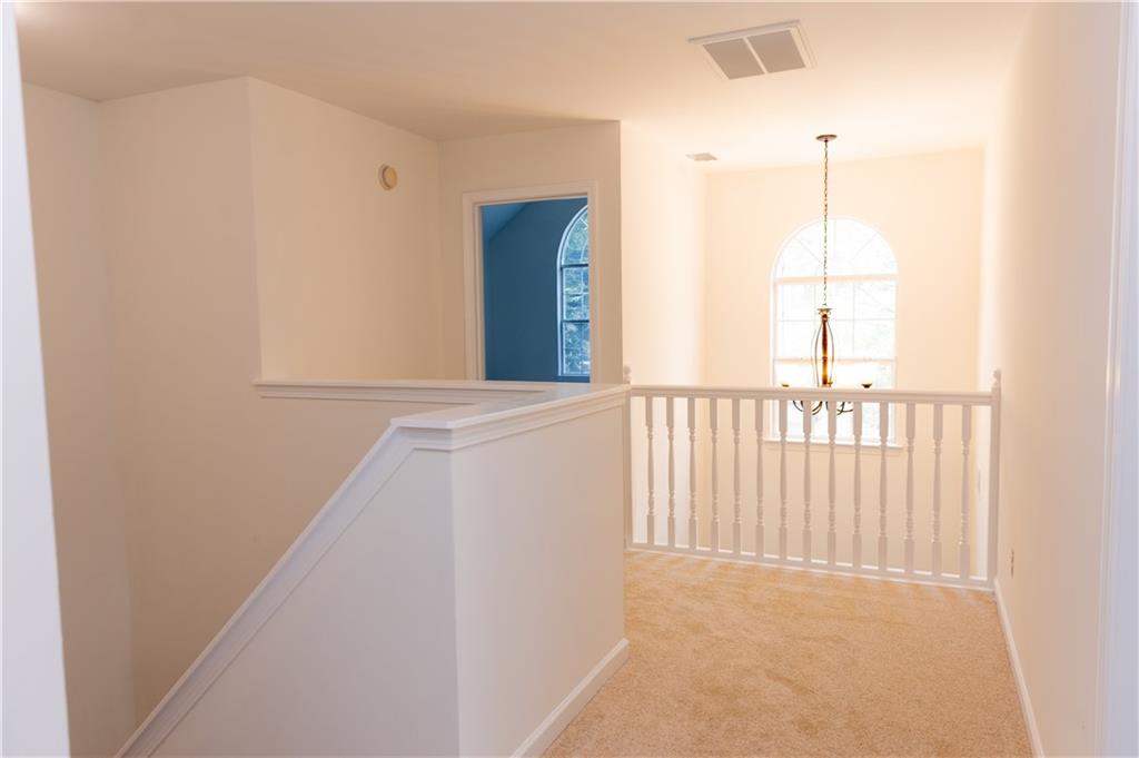 502 Streamside Place Canton, GA 30115 - Photo 16 of 33 a view of a white door and a window