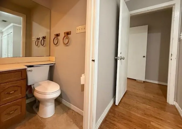 a bathroom with a toilet and a sink