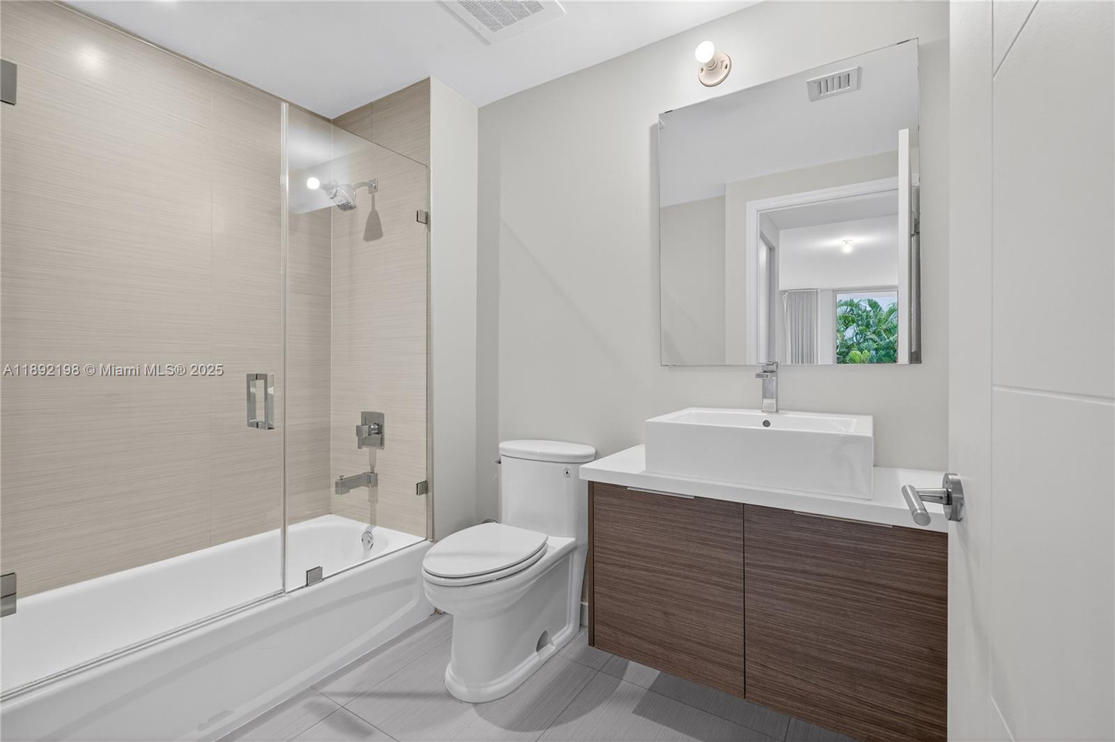 1010 Southwest 2nd Avenue, Unit 603 Miami, FL 33130 - Photo 22 of 84 a bathroom with a sink toilet and shower