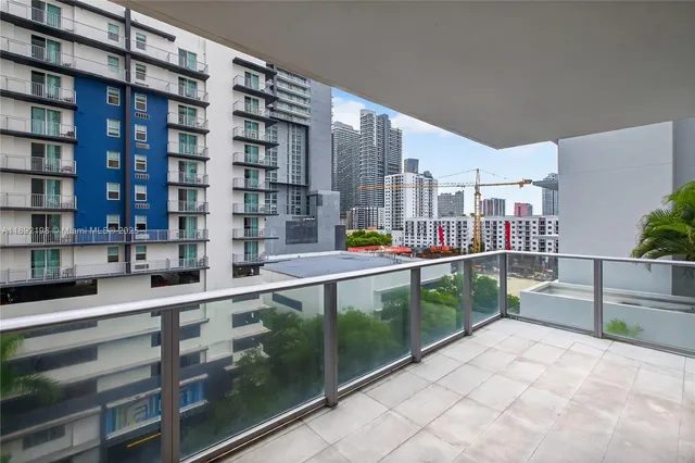 a view of living room filled with furniture
