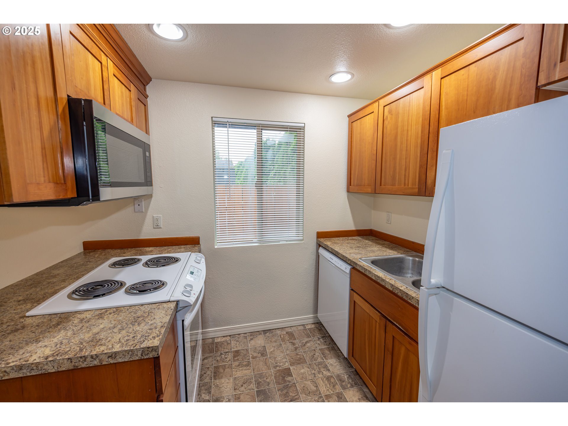 3600 A Street, Unit 6 Washougal, WA 98671 - Photo 9 of 15 a kitchen with a stove and a microwave