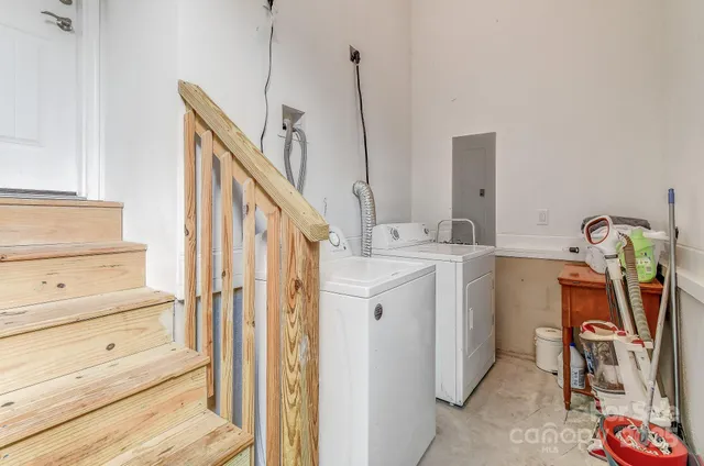 a view of hallway with washer and dryer