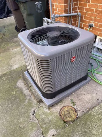 a kitchen with white cabinets and a stove