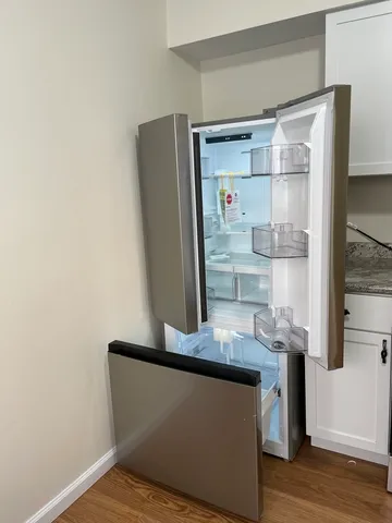 a room with table and chairs