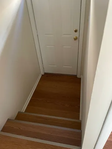 a bathroom with a sink toilet and a mirror