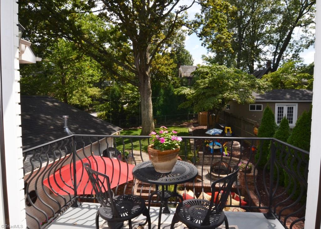 1901 Rolling Road Greensboro, NC 27403 - Photo 12 of 30 Balcony off of Master Bedroom Overlooking Back Yard and Outdoor Entertaining Area