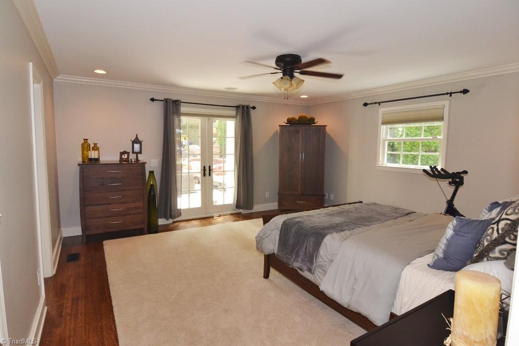 1901 Rolling Road Greensboro, NC 27403 - Photo 17 of 30 Bedroom with French Door leading to Outdoor Patio