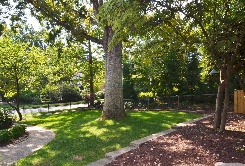 1901 Rolling Road Greensboro, NC 27403 - Photo 28 of 30 Gated Back Yard with Nice Landscaping