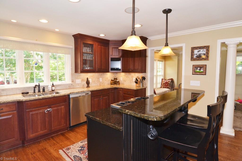 1901 Rolling Road Greensboro, NC 27403 - Photo 7 of 30 Kitchen with Great Natural Light and Island