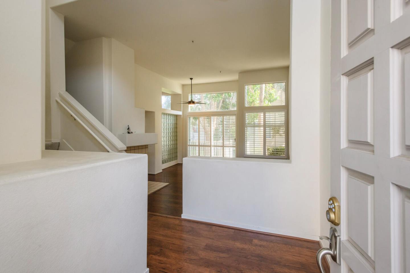 848 Columbia Circle Redwood City, CA 94065 - Photo 2 of 19 a view of entryway with wooden floor and stairs