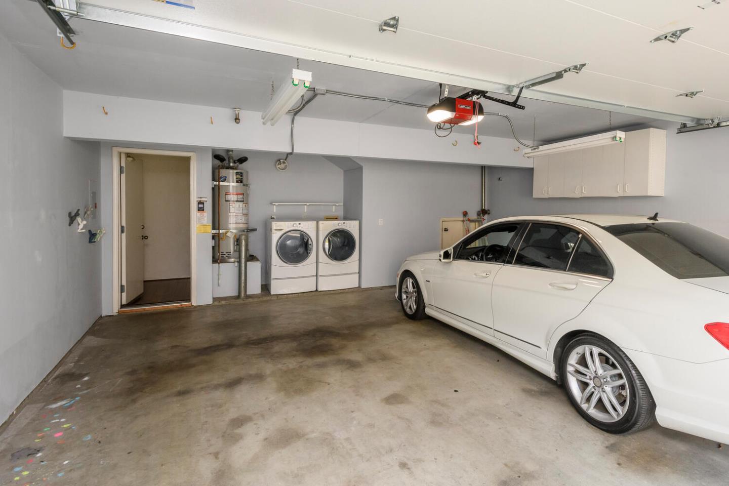 848 Columbia Circle Redwood City, CA 94065 - Photo 14 of 19 a car parked in a garage