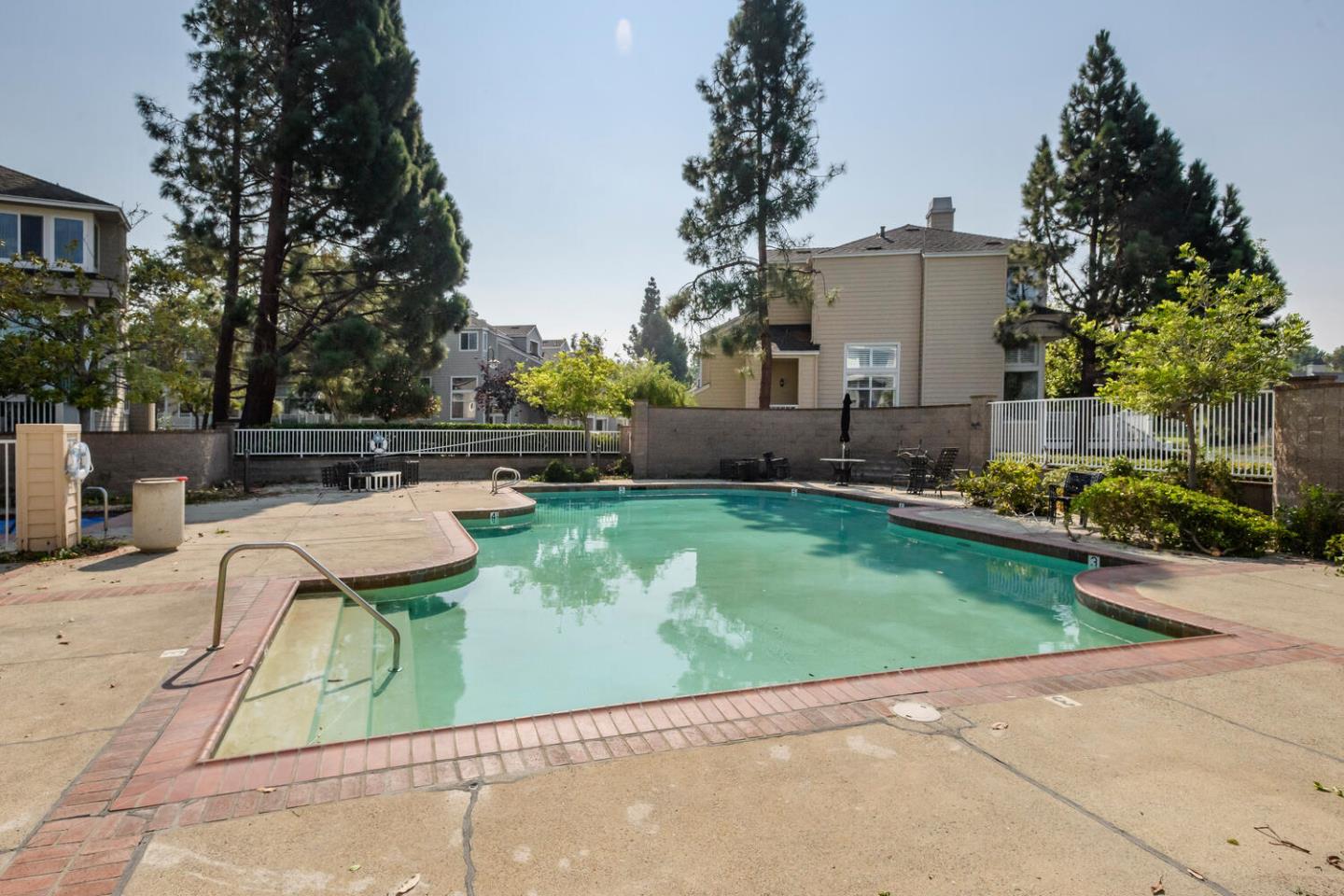 848 Columbia Circle Redwood City, CA 94065 - Photo 16 of 19 a view of backyard with swimming pool and seating area