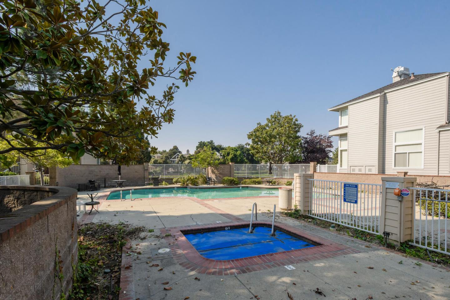 848 Columbia Circle Redwood City, CA 94065 - Photo 17 of 19 a view of a swimming pool with a patio