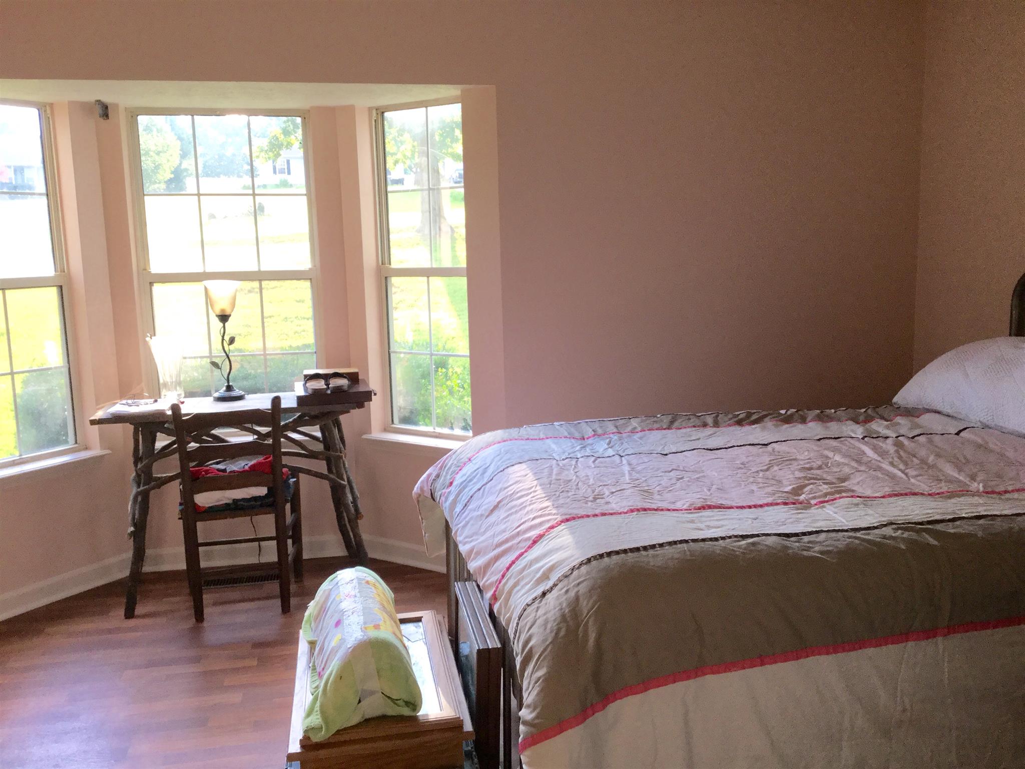 921 Hargrove Road West Dickson, TN 37055 - Photo 6 of 10 a bedroom with a bed and a window