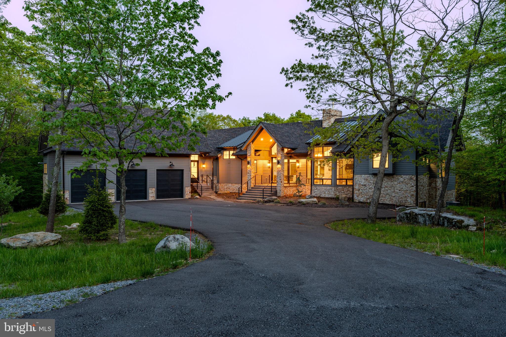 422 Mountaintop Road McHenry, MD 21541 - Photo 6 of 107 a front view of a house with garden