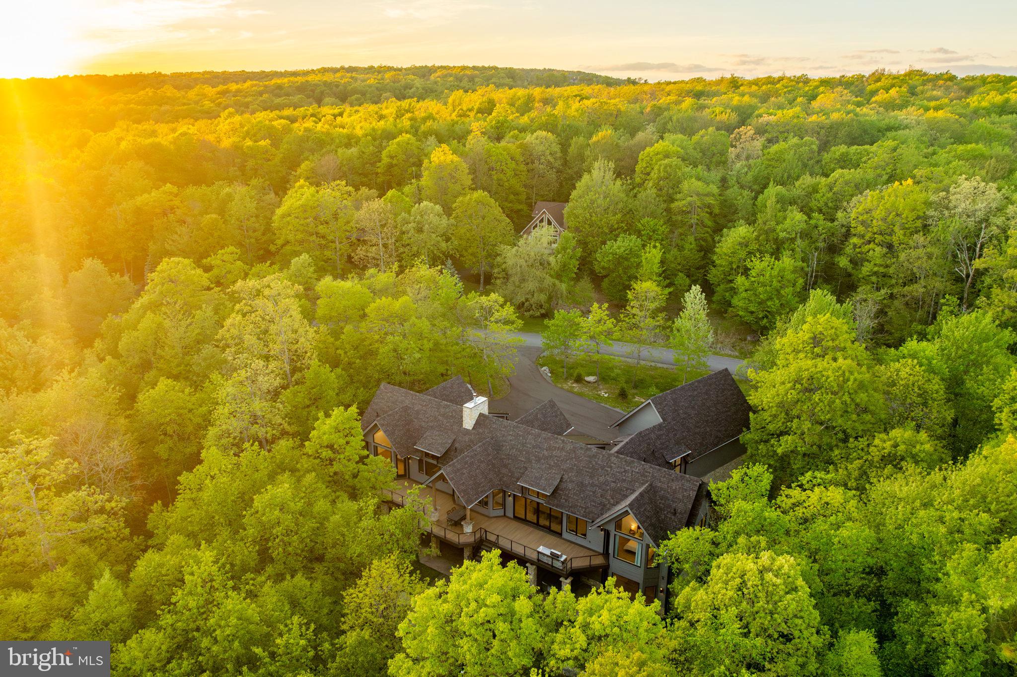 422 Mountaintop Road McHenry, MD 21541 - Photo 96 of 107 a view of a lake with a house in the background