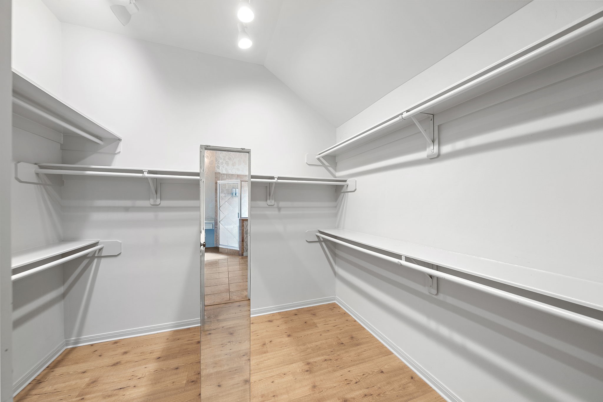 1429 Oneil Street Houston, TX 77019 - Photo 16 of 23 a view of an empty walk in closet