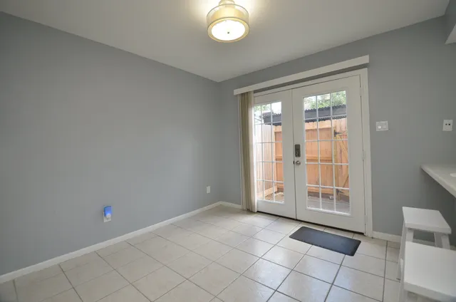 a view of a kitchen with windows